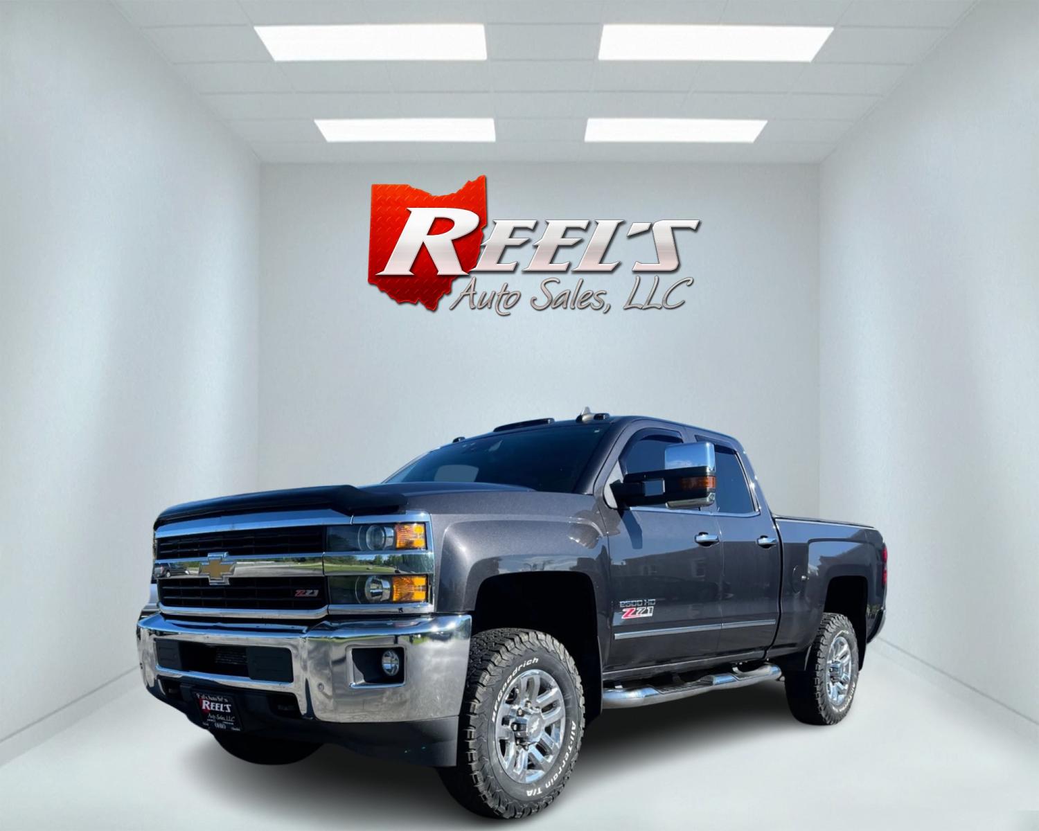 2016 Gray /Black Chevrolet Silverado 2500HD LTZ Z71 Double Cab 4WD (1GC2KWEG7GZ) with an 6.0L V8 OHV 16V FFV engine, 6-Speed Automatic transmission, located at 11115 Chardon Rd. , Chardon, OH, 44024, (440) 214-9705, 41.580246, -81.241943 - This 2016 Chevrolet Silverado 2500 HD LTZ Z71 Double Cab is a heavy-duty pickup truck that combines immense capability with premium features. Powered by a 6.0L Vortec V8 engine with flex-fuel capability and a 6-speed automatic transmission, it boasts a 13,200-pound towing capacity and a 2,796-pound - Photo #0